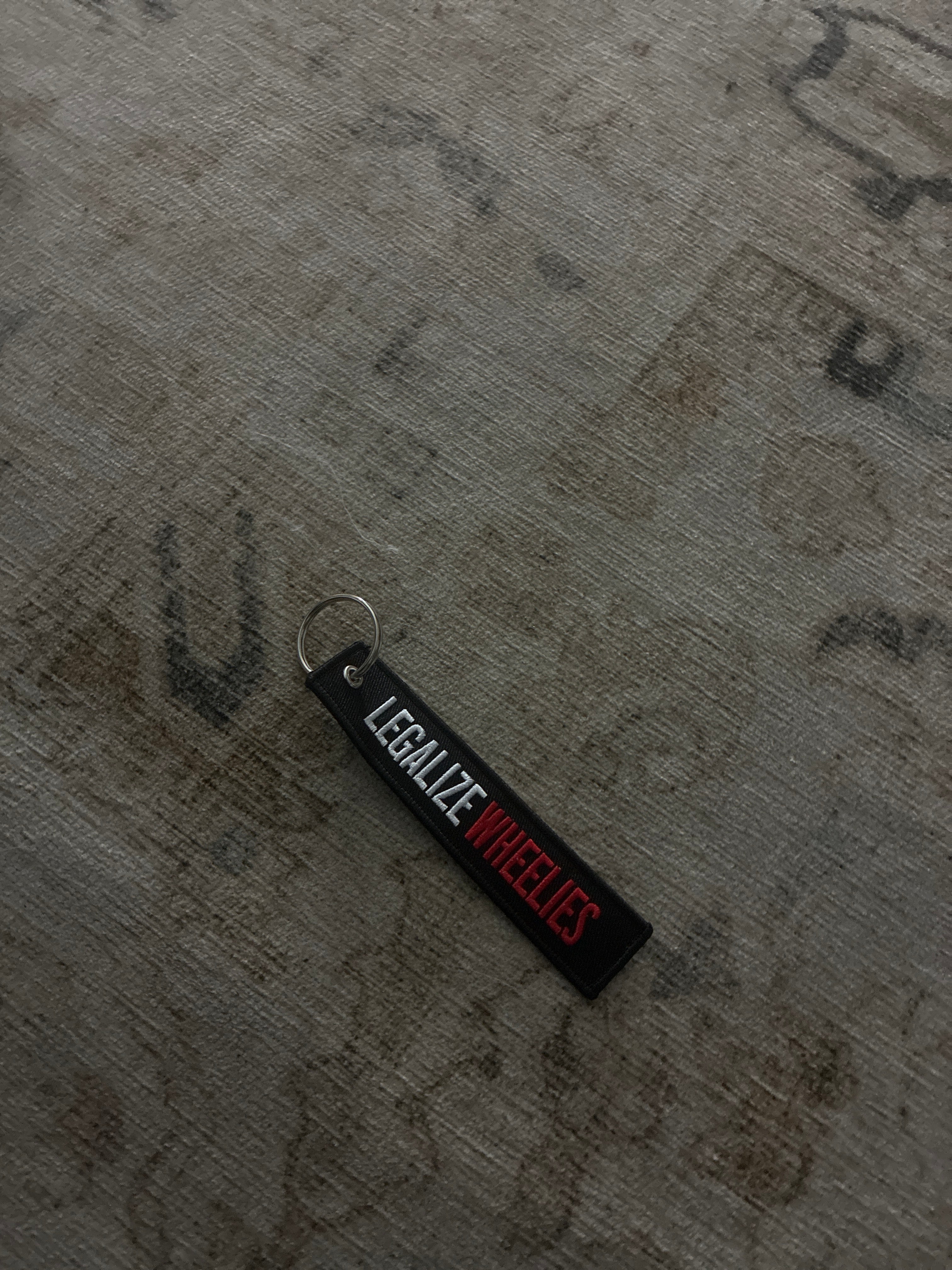 Legalize wheelies keychain ￼